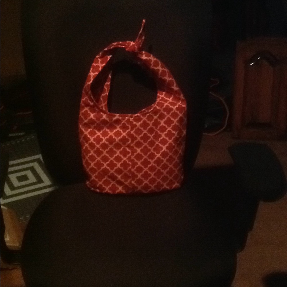 Red and gold hobo bag
